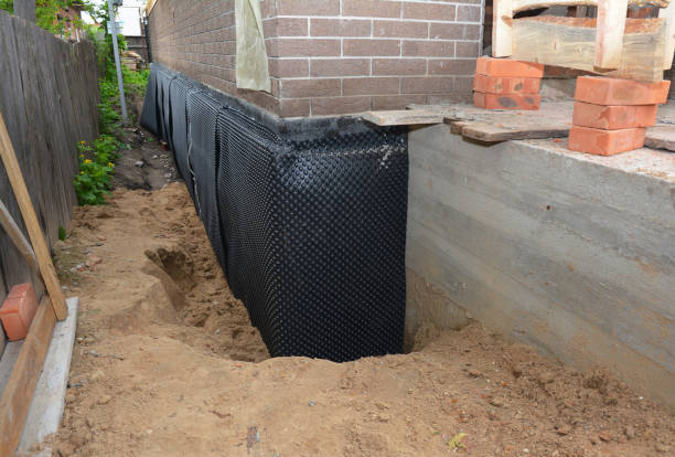 SJ Waterproofing Pros technician performing targeted Exterior Waterproofing assessment in Malta, OH